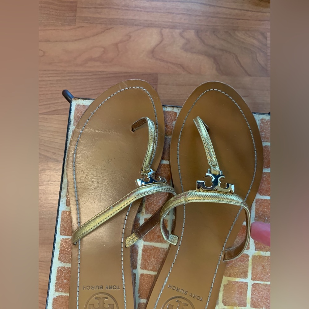 Tory Burch gold flip-flop size 8